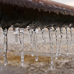 Roof in need of gutter trace and roof deicing system